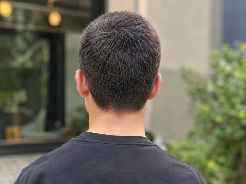 Back view of a 4 guard buzz cut with no fade