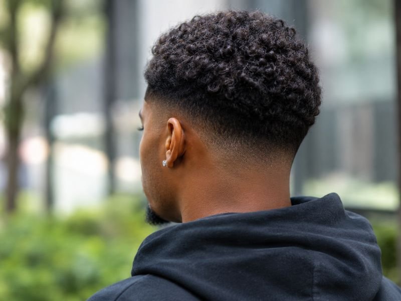 Back view of a low taper fade near the neckline
