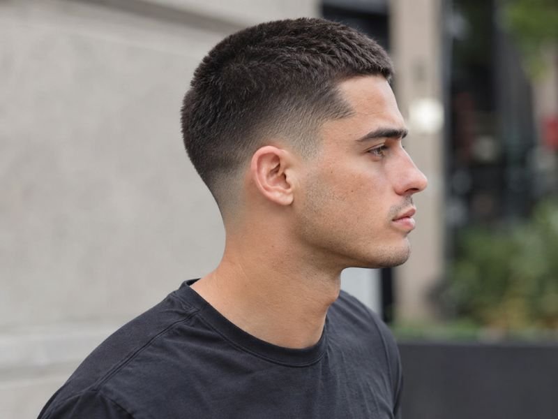 Side profile of an 8 guard buzz cut with low taper